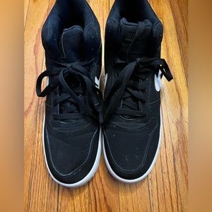 Black and white Nike high top sneakers